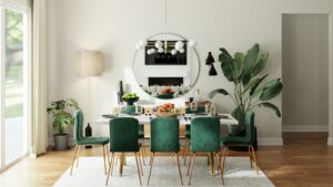 A photo of a dining room with green dining chairs and a large sliding door.